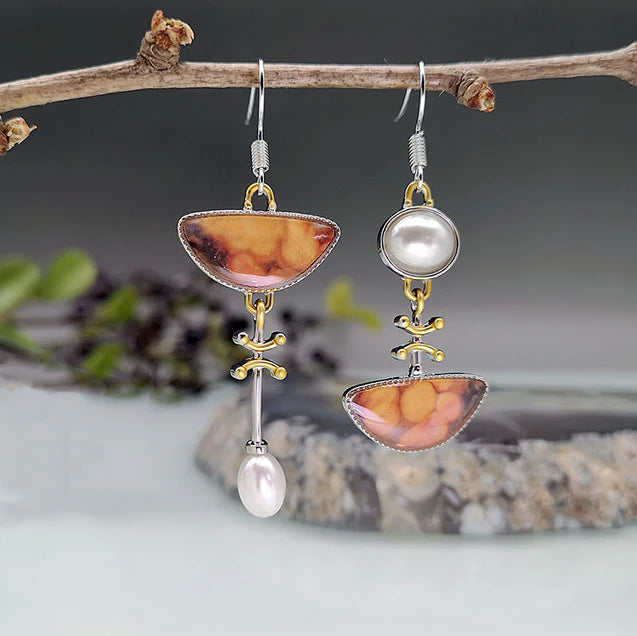 Retro-Chic Orange Earrings with a Divine Touch