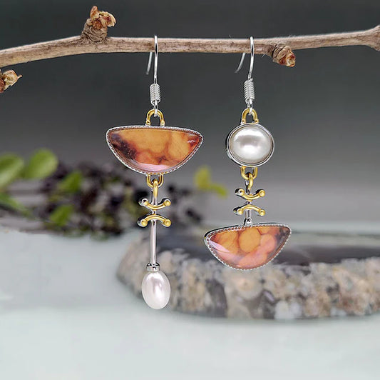Retro-Chic Orange Earrings with a Divine Touch